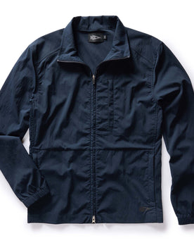 flatlay of The Deploy Packable Shell in Dark Navy, Outerwear by Taylor Stitch