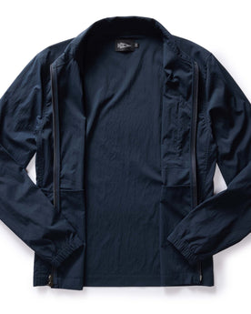flatlay of the inside of The Deploy Packable Shell in Dark Navy, Outerwear by Taylor Stitch