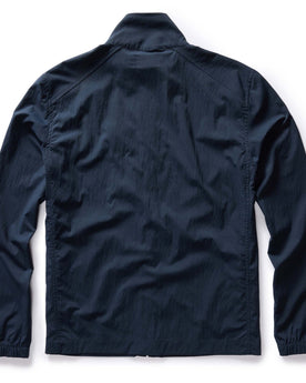 flatlay of the back of The Deploy Packable Shell in Dark Navy, Outerwear by Taylor Stitch