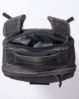 material shot of the back pocket of The GR1 USA in Raindrop Camo Ripstop WashWax, Accessories by Taylor Stitch