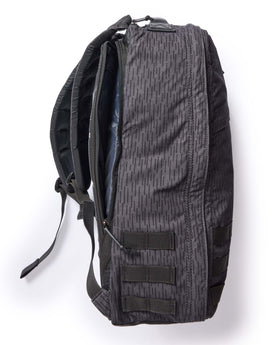 material shot of the side pocket on The GR1 USA in Raindrop Camo Ripstop WashWax, Accessories by Taylor Stitch