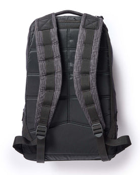 material shot of the back and straps on The GR1 USA in Raindrop Camo Ripstop WashWax, Accessories by Taylor Stitch