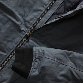 material shot of the YKK two way separating zipper on The Bomber Jacket in Charcoal Dry Wax