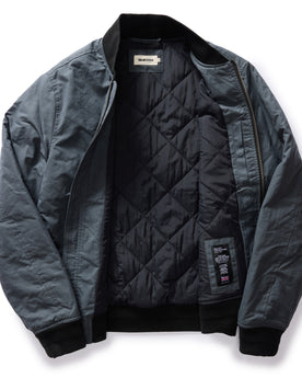 flatlay lay of The Bomber Jacket in Charcoal Dry Wax, shown open, Outerwear by Taylor Stitch