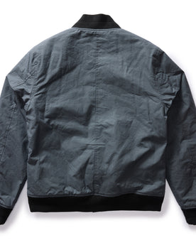 flatlay of The Bomber Jacket in Charcoal Dry Wax, from the back, Outerwear by Taylor Stitch
