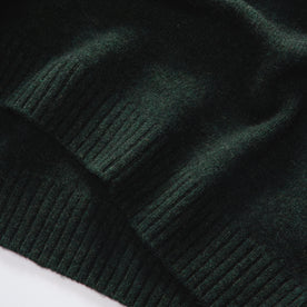 material shot of the ribbed hem on The Lodge Sweater in Black Pine