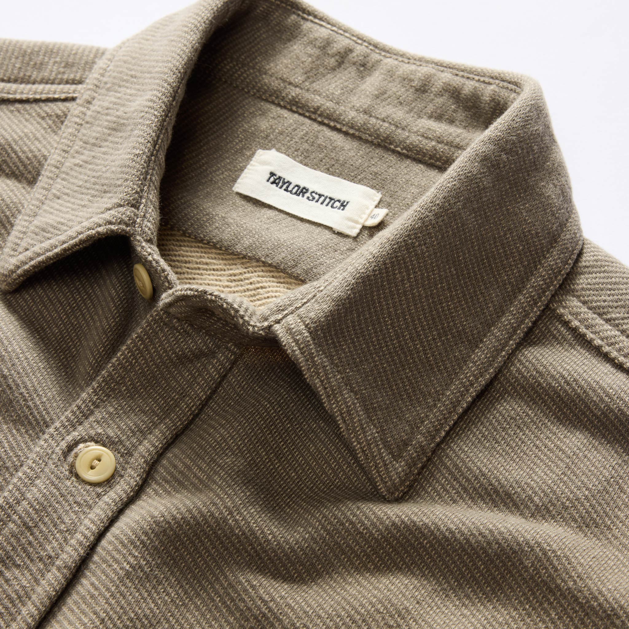 material shot of the collar on The Utility Shirt in Fatigue Olive French Terry Twill Knit, Knits by Taylor Stitch