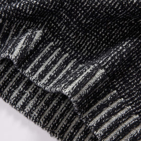 material shot of the ribbed hem on The Headland Sweater in Coal Heather