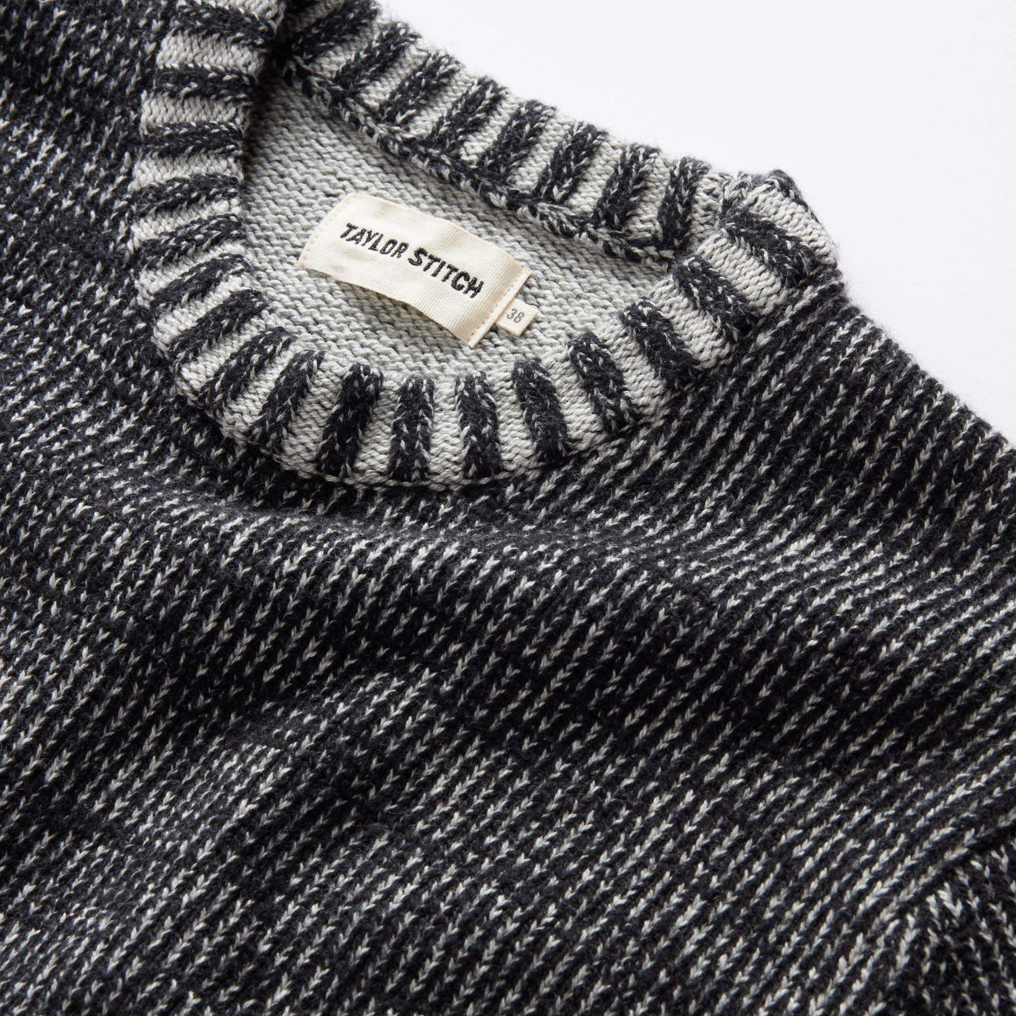 material shot of the ribbed neck opening on The Headland Sweater in Coal Heather, Knits by Taylor Stitch
