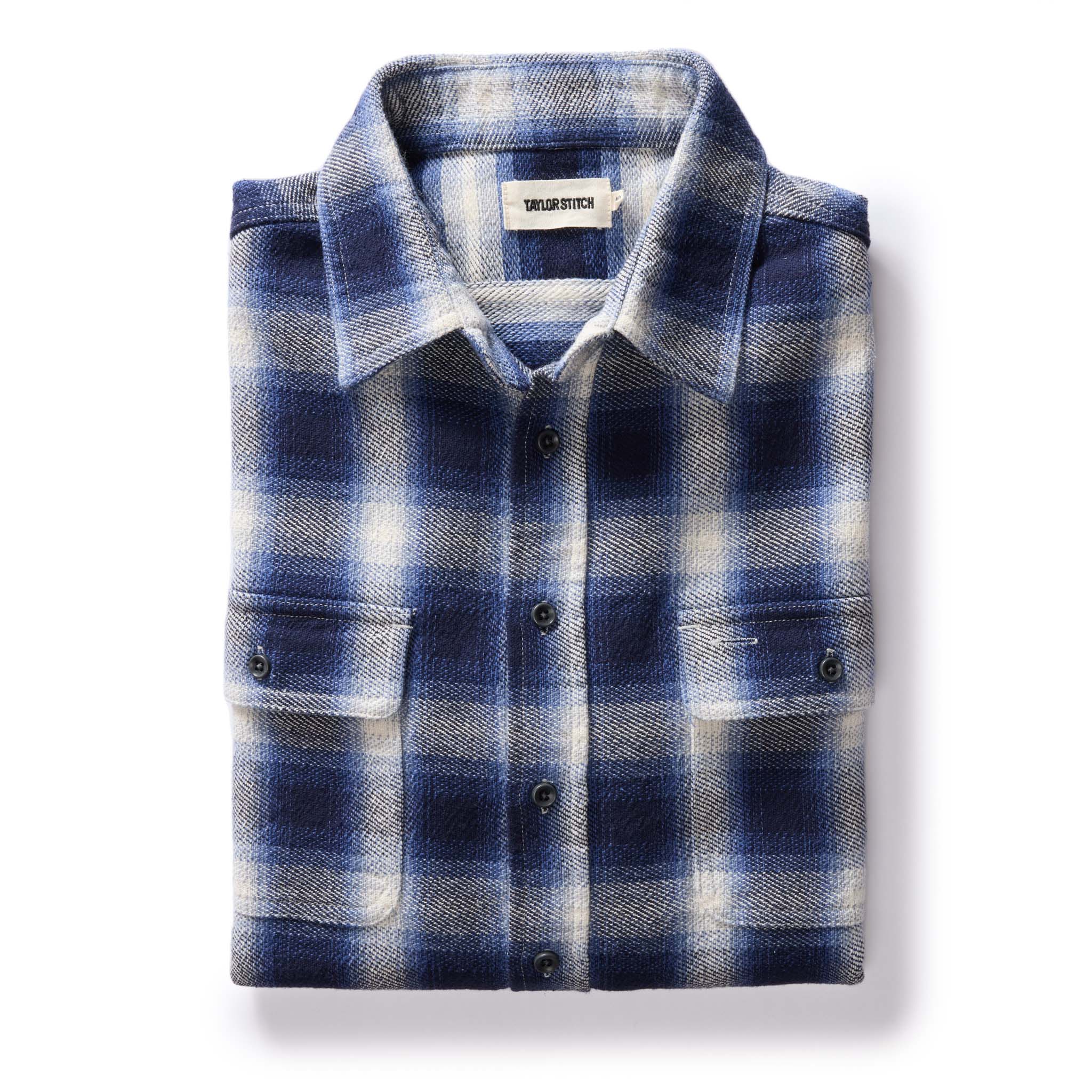 flatlay of The Ledge Shirt in Blue Sky Plaid, Wovens by Taylor Stitch