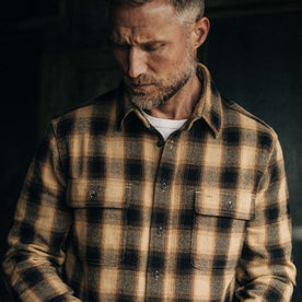 fit model showing the front of The Ledge Shirt in Brass Plaid