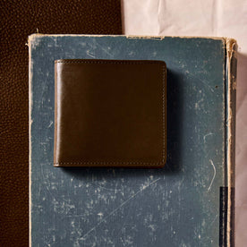 editorial flatlay of The Minimalist Billfold Wallet in Brown