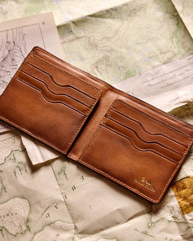 editorial flatlay of the inside pockets on The Minimalist Billfold Wallet in Brown, Accessories by Taylor Stitch