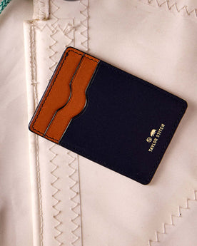 editorial flatlay for The Minimalist Wallet in Navy, Accessories by Taylor Stitch