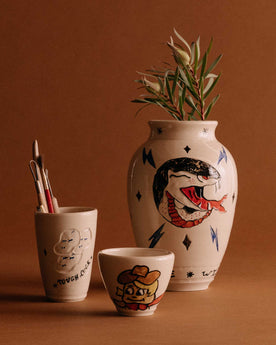 The Pit Viper Vase next to other ceramic pieces, Accessories by Taylor Stitch