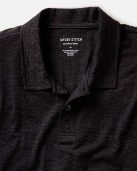 fit model showing off The Merino Polo in Heather Black, Knits by Taylor Stitch