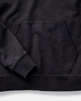 material shot of the hem on The Apres Hoodie in Black Indigo Terry, Knits by Taylor Stitch