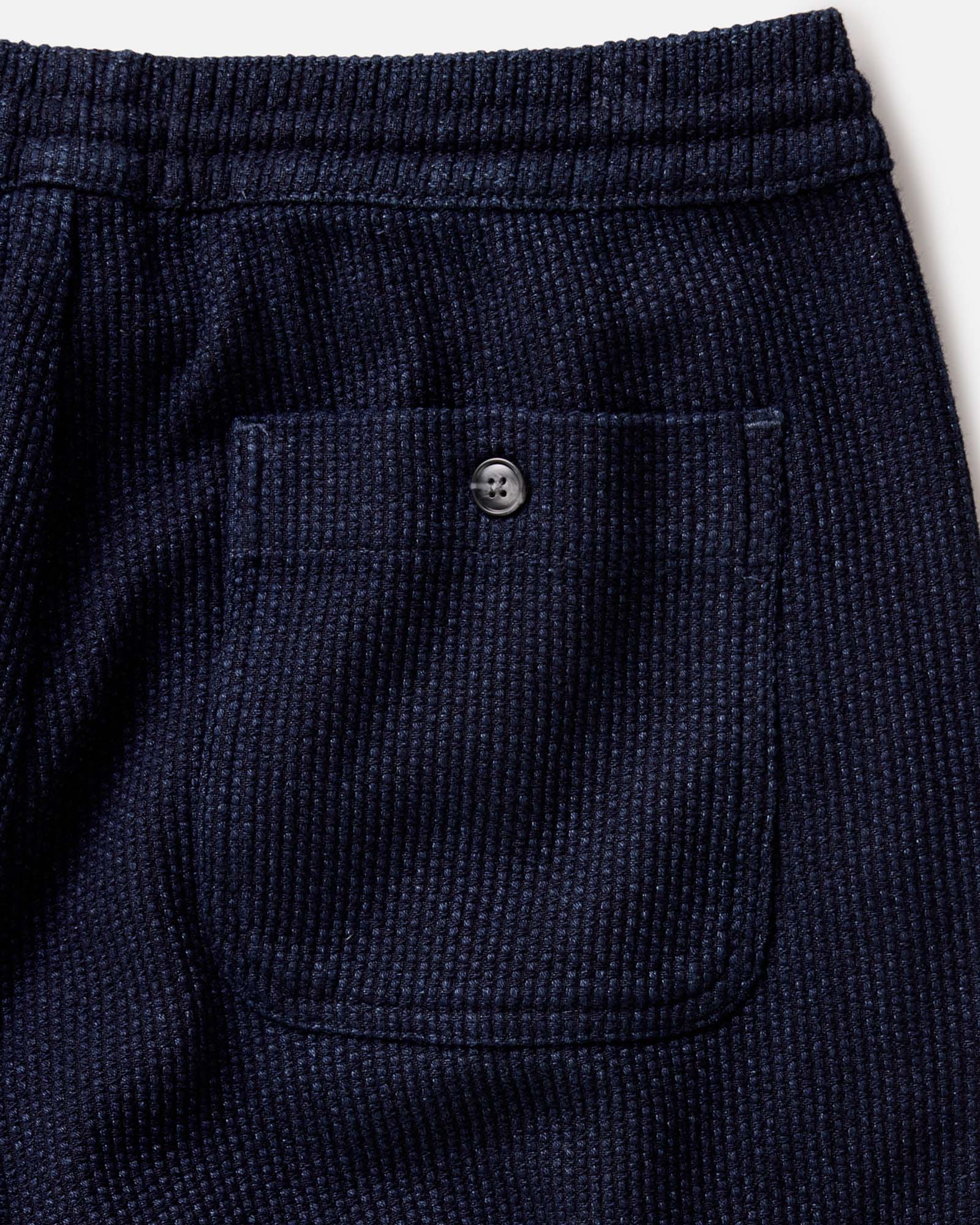 material shot of the waistband on The Apres Pant in Rinsed Indigo Sashiko, Bottoms by Taylor Stitch