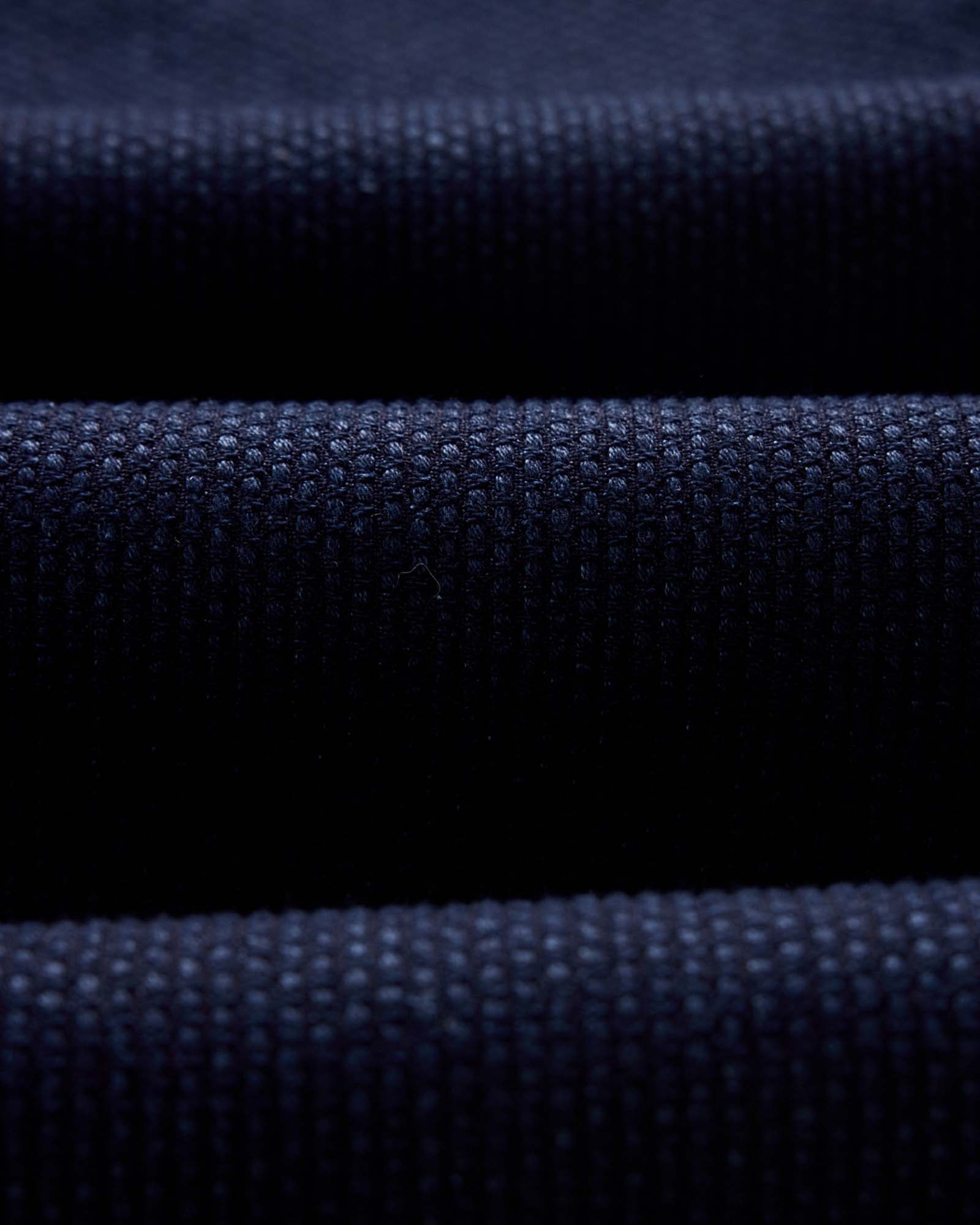 folded flatlay of the back of The Apres Pant in Rinsed Indigo Sashiko, Bottoms by Taylor Stitch