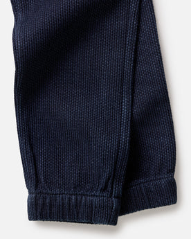 folded flatlay of the back of The Apres Pant in Rinsed Indigo Sashiko, Bottoms by Taylor Stitch