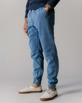 fit model with his hand in his pocket of The Apres Pant in Washed Indigo Sashiko, Bottoms by Taylor Stitch