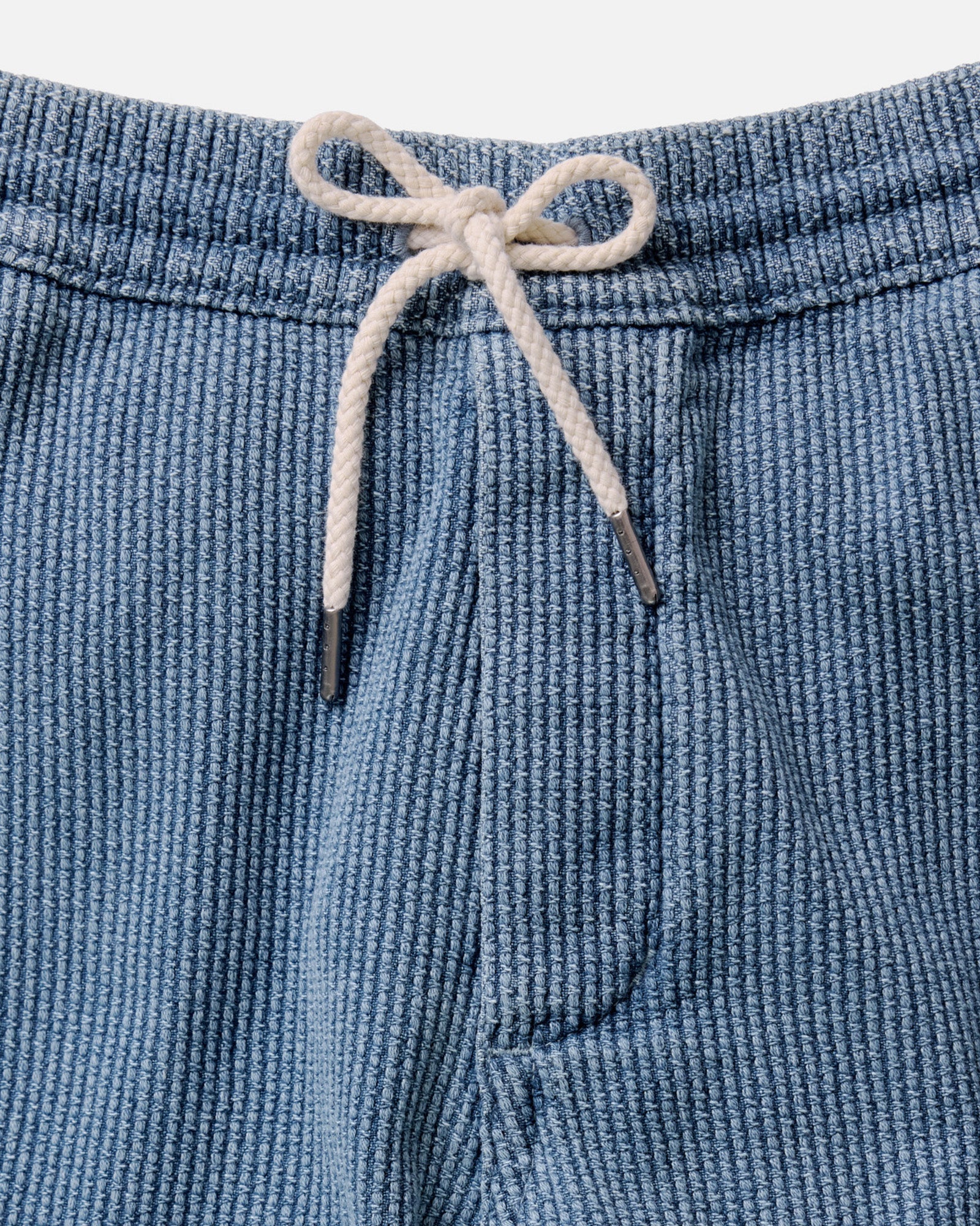 material shot of the waistband on The Apres Pant in Washed Indigo Sashiko, Bottoms by Taylor Stitch