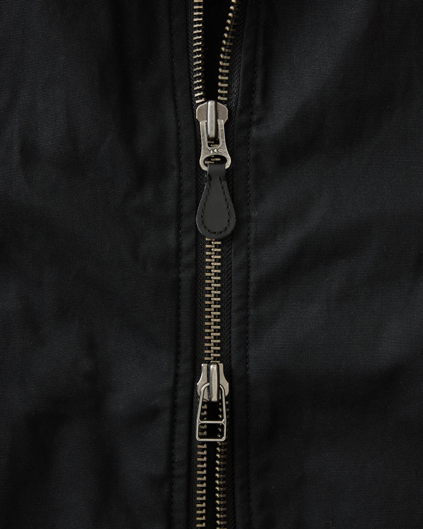 fit model standing in The Insulated Bomber Jacket in Coal Dry Wax, Outerwear by Taylor Stitch