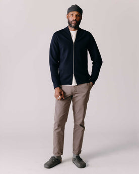 fit model standing wearing The Democratic Foundation Pant in Organic Espresso, Bottoms by Taylor Stitch