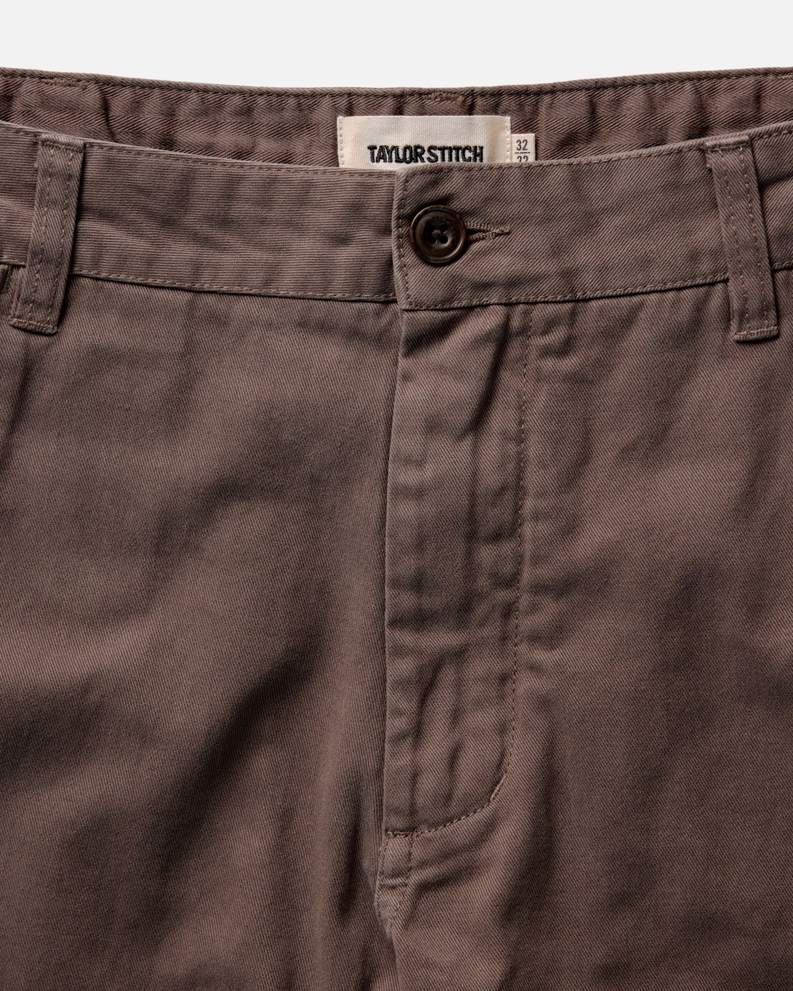 material shot of the waistband on The Democratic Foundation Pant in Organic Espresso, Bottoms by Taylor Stitch