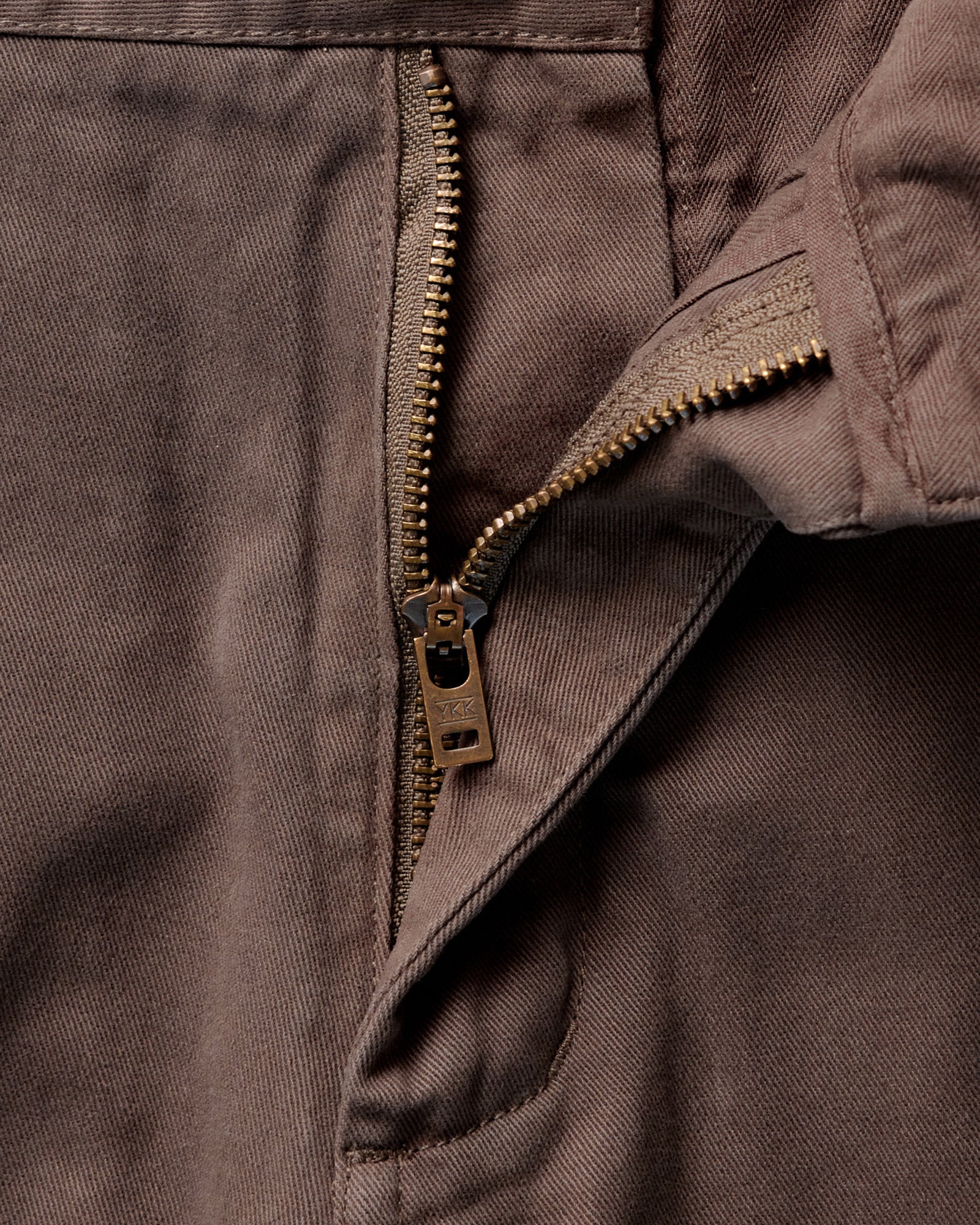 material shot of the zipper on The Democratic Foundation Pant in Organic Espresso, Bottoms by Taylor Stitch
