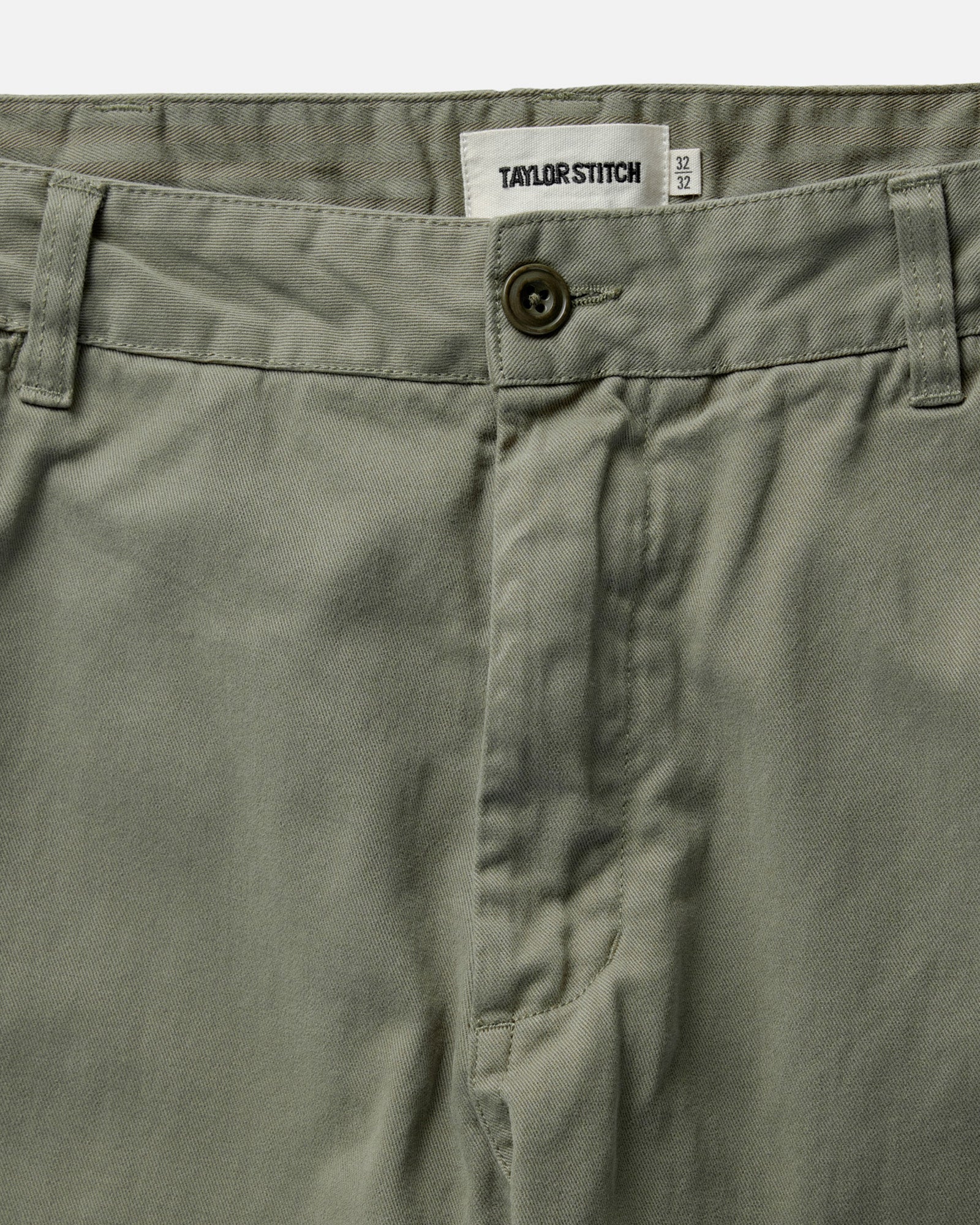 material shot of the waistband on The Democratic Foundation Pant in Organic Smoked Olive, Bottoms by Taylor Stitch