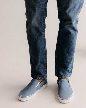 fit model showing off bottom hem on The Democratic Jean in Mid Wash Organic Selvedge, Bottoms by Taylor Stitch