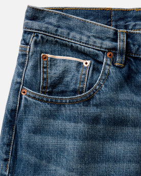 material shot of the collar on The Democratic Jean in Mid Wash Organic Selvedge, Bottoms by Taylor Stitch