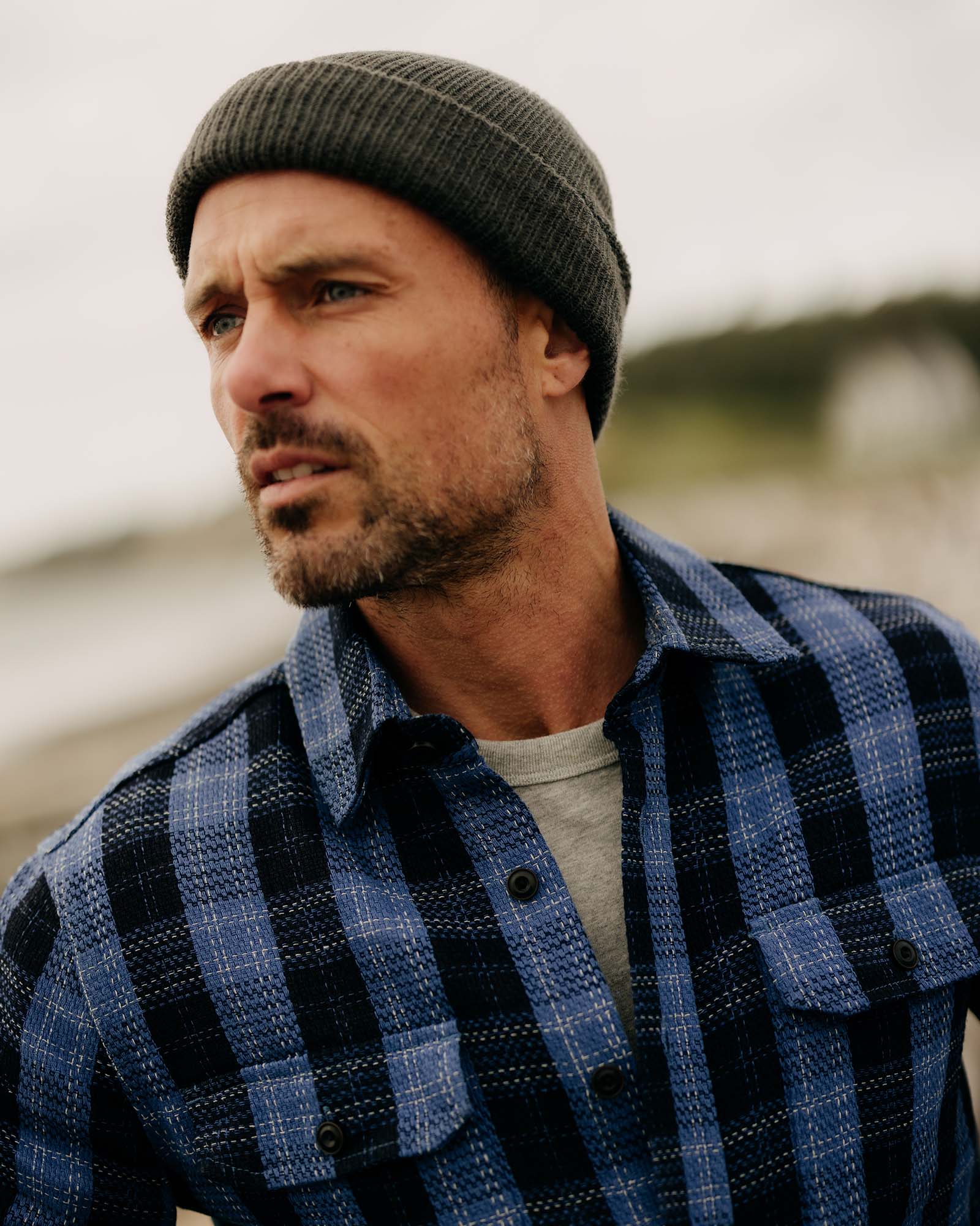 fit model showing off the collar on The Division Shirt in Rinsed Indigo Plaid, Wovens by Taylor Stitch