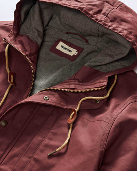material shot of the hood on The Explorer Jacket in Red Wine Dry Wax, Outerwear by Taylor Stitch