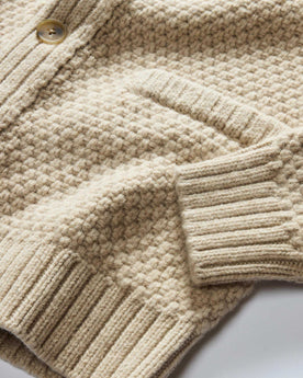 material shot of the cuffs on The Fisherman Shawl Cardigan in Heather Oat Merino, Knits by Taylor Stitch