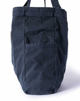 editorial image of the side pocket on The Foundation Tote in Organic Navy, Accessories by Taylor Stitch