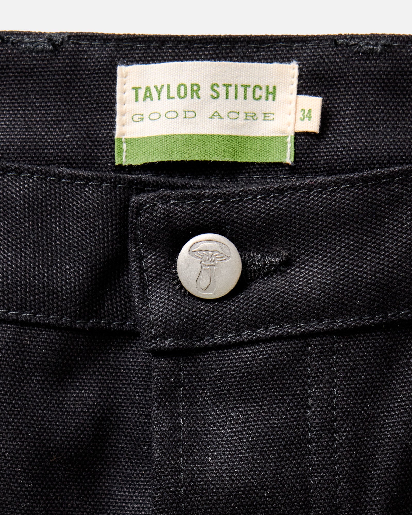 material shot of the waistband on The Good Acre Chore Pant in Black Canvas, Bottoms by Taylor Stitch