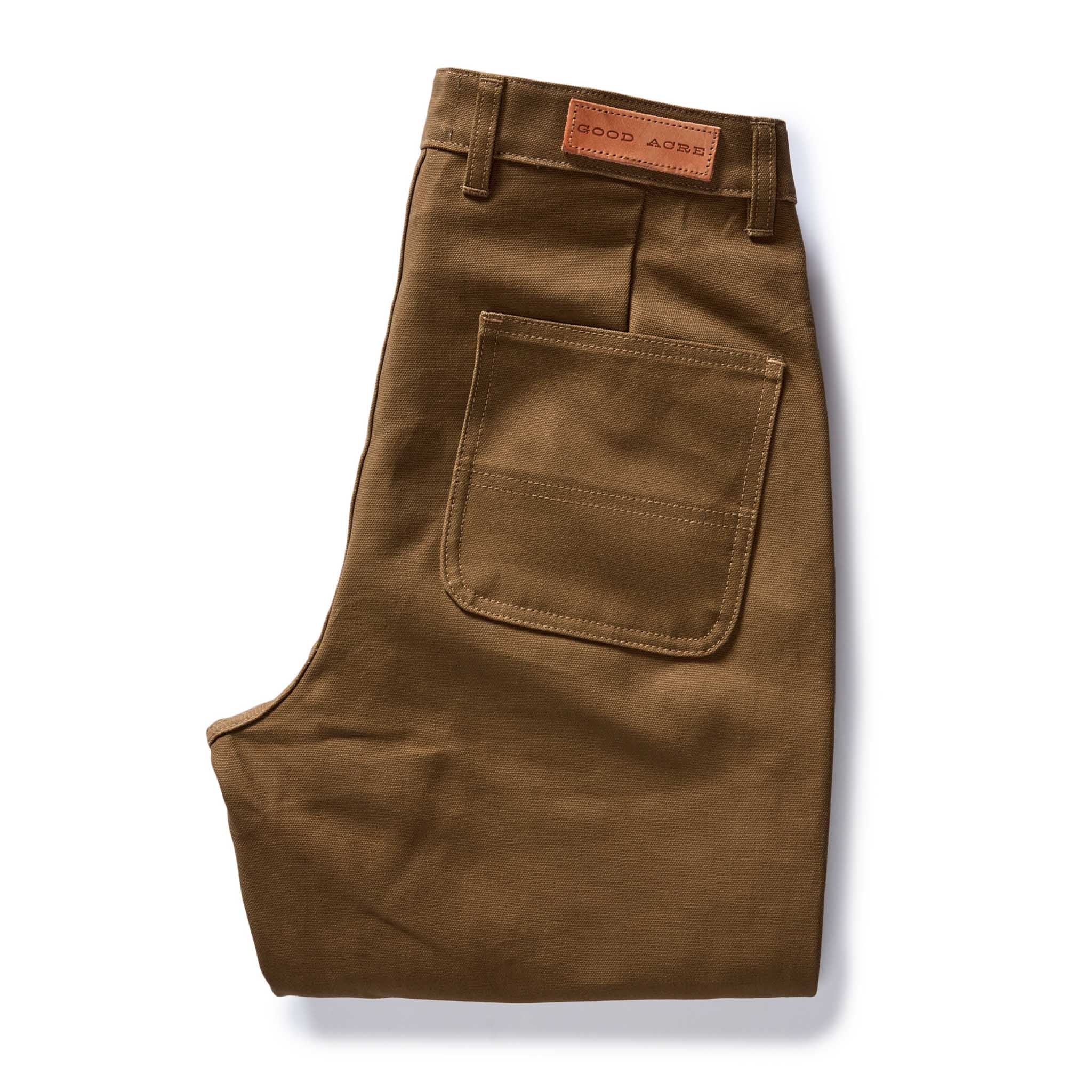 folded flatly of the back of The Good Acre Chore Pant in Tan Canvas, Bottoms by Taylor Stitch