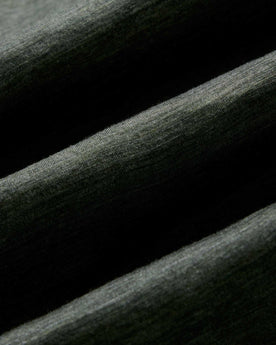 material shot of the sleeve on The Merino Tee in Heather Army, Knits by Taylor Stitch