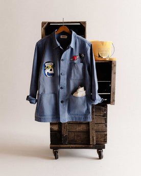 editorial image of The Ojai Jacket in Embroidered French Blue Herringbone hanging, Outerwear by Taylor Stitch