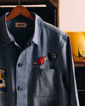 editorial image of the embroidery details on The Ojai Jacket in Embroidered French Blue Herringbone, Outerwear by Taylor Stitch