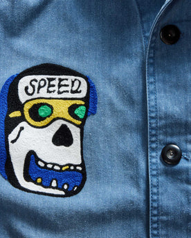 material shot of the buttons on The Ojai Jacket in Embroidered French Blue Herringbone, Outerwear by Taylor Stitch