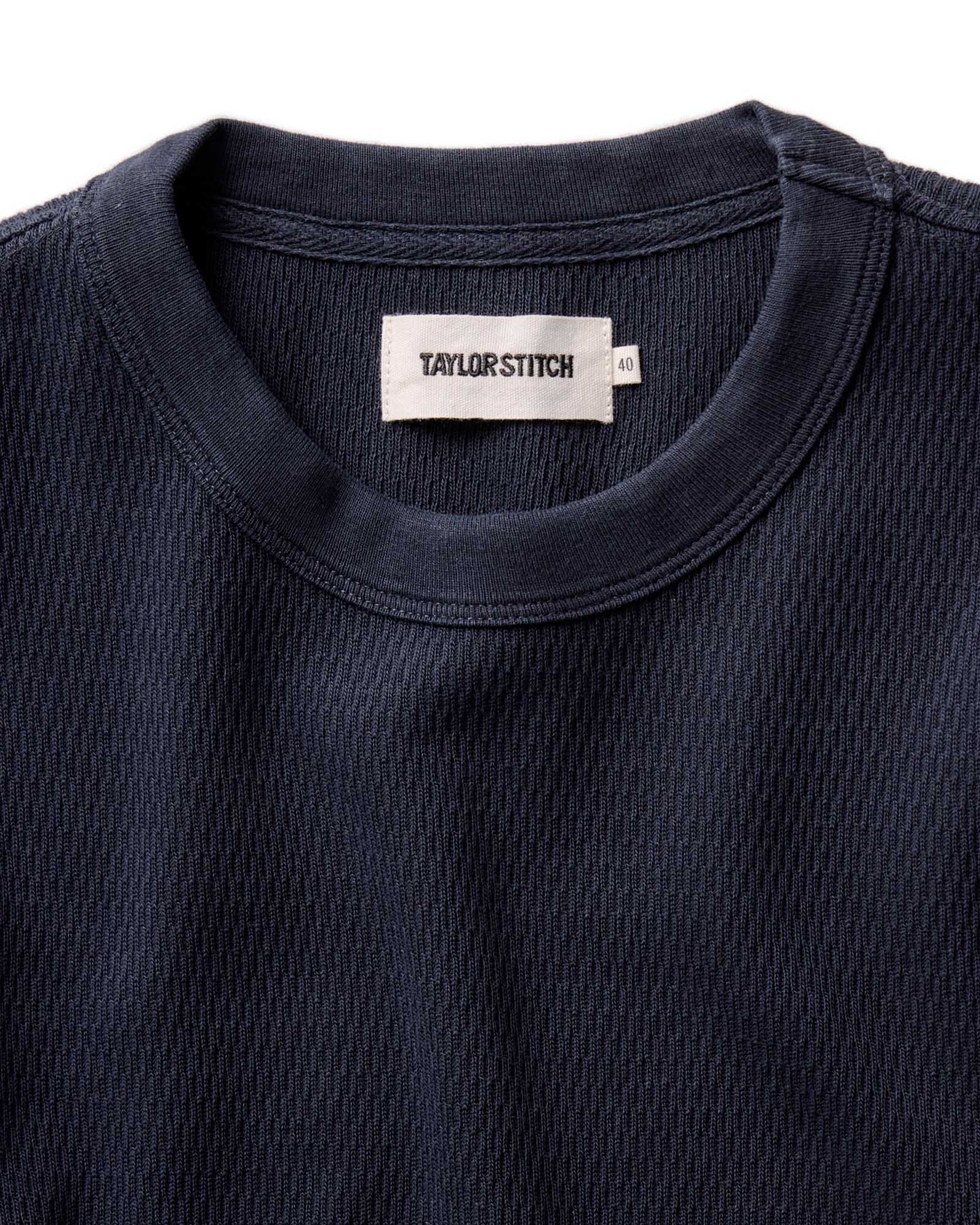 material shot of the collar on The Organic Cotton Short Sleeve Crew in Dark Navy Waffle, Knits by Taylor Stitch