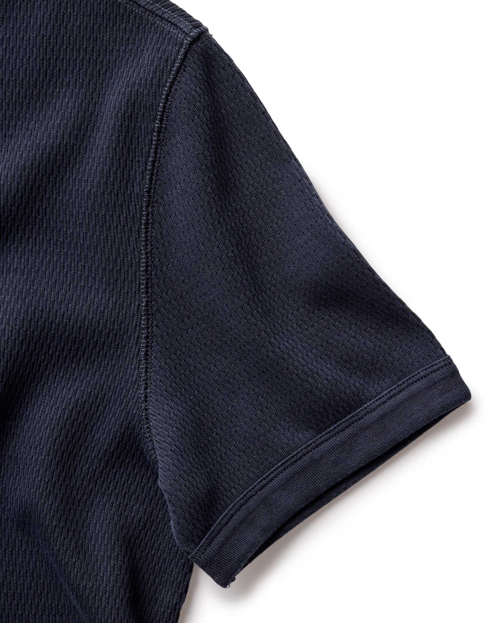 material shot of the sleeve on The Organic Cotton Short Sleeve Crew in Dark Navy Waffle, Knits by Taylor Stitch
