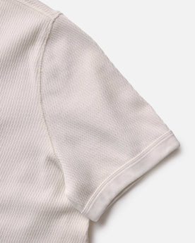 material shot of the sleeves on The Organic Cotton Short Sleeve Crew in Vintage White Waffle, Knits by Taylor Stitch