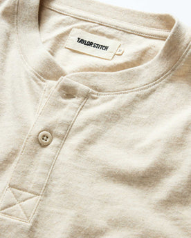 material shot of the collar on The Organic Cotton Henley in Heather Oat, Knits by Taylor Stitch