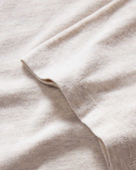 material shot of the sleeve on The Organic Cotton Tee in Heather Oat, Knits by Taylor Stitch