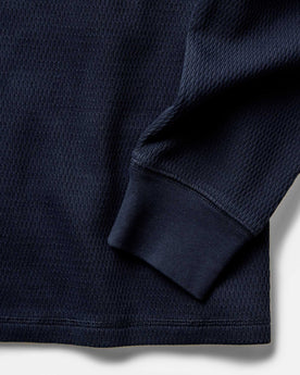 material shot of the ribbed cuffs on The Organic Cotton Waffle Crew Dark Navy, Knits by Taylor Stitch