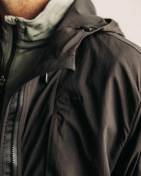 fit model zipping up The Ridgeline Jacket in Coal, Outerwear by Taylor Stitch